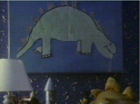 Stegosaurus drawing, or flag or something.
